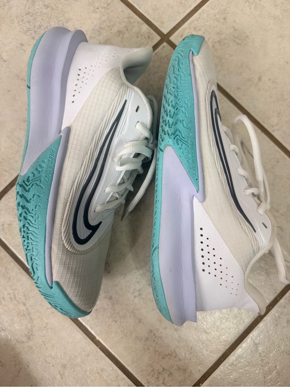 Men White basketball shoes with Teal Accents